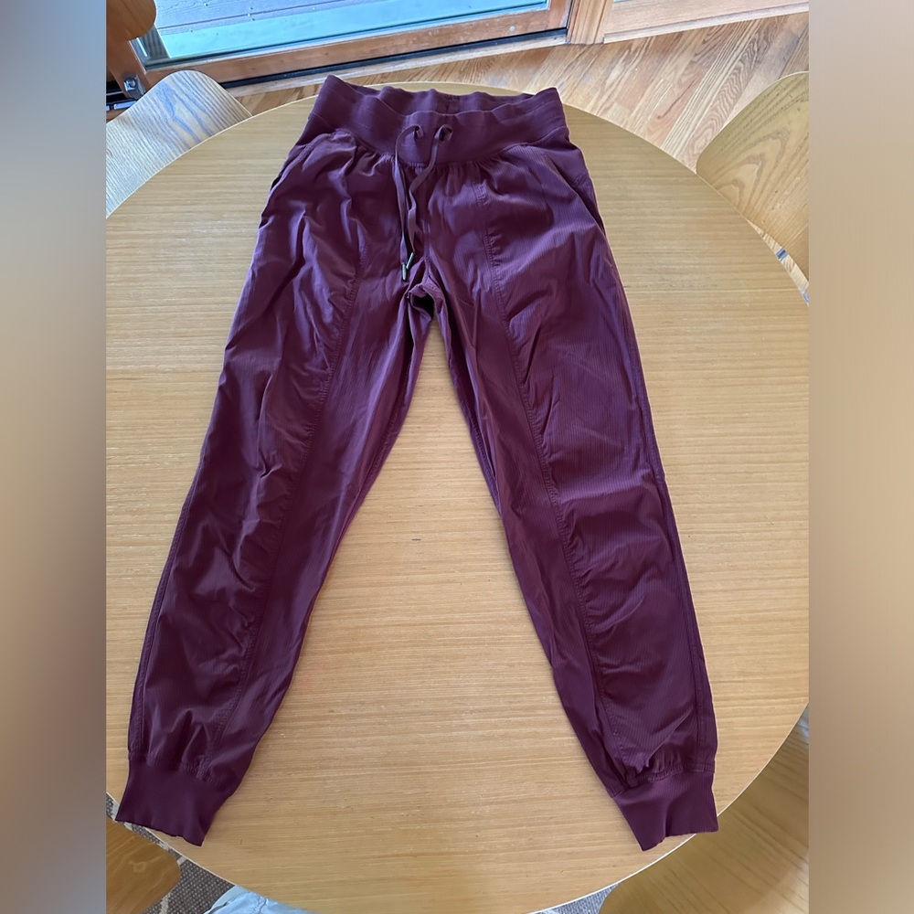 Lululemon dance studio jogger in burgundy size 6. Very good condition.